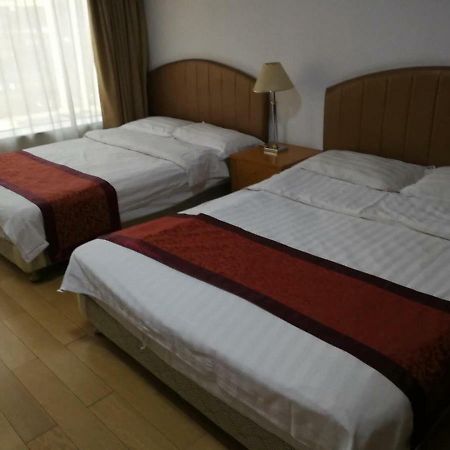 Beijing New World Centre Aparthotel Esterno foto