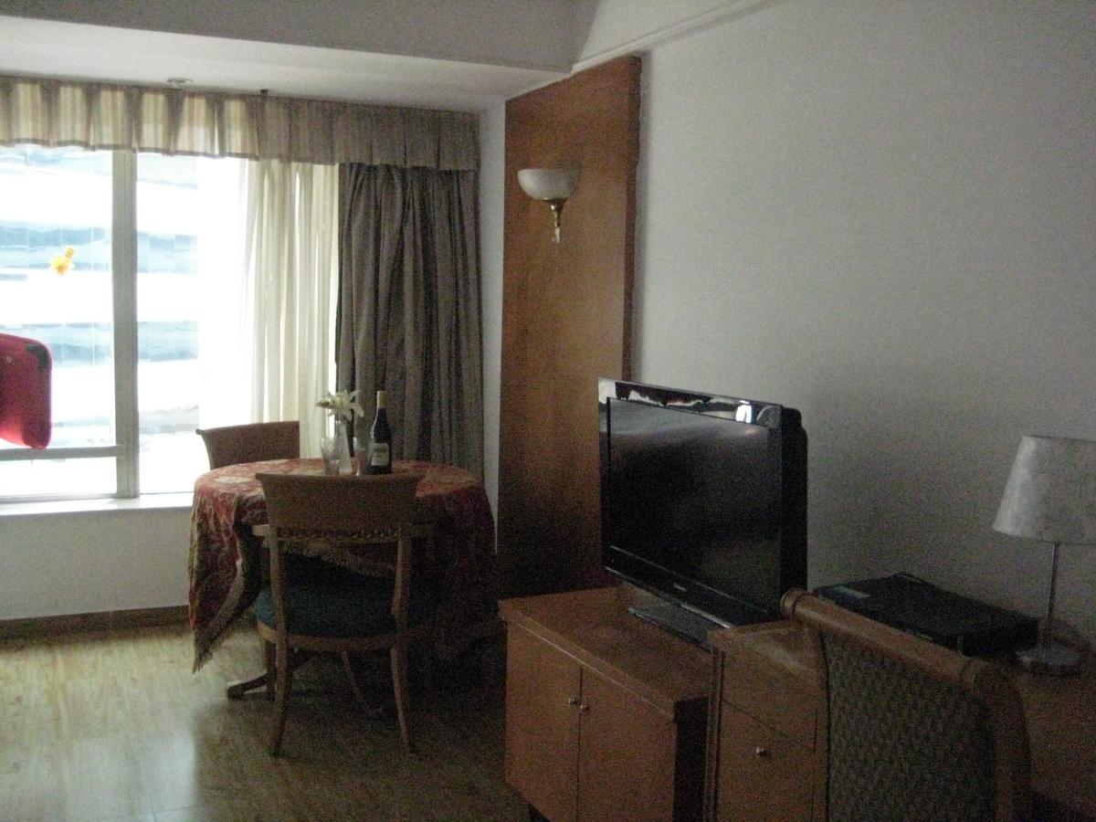 Beijing New World Centre Aparthotel Esterno foto