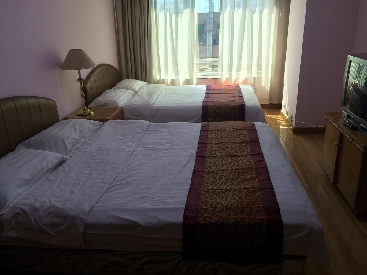 Beijing New World Centre Aparthotel Esterno foto