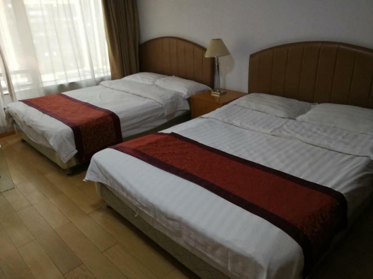 Beijing New World Centre Aparthotel Esterno foto